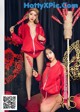 a couple of women in red outfits posing for a magazine