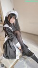 Coser @ 桜 井 宁宁 Vol.030: 双 马尾 黑丝 女仆 (62 photos) P40 No.81ab8f Image No. 45